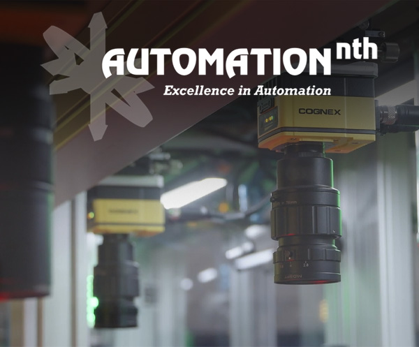 Cognex vision system cameras are mounted over a manufacturing line to perform inspection tasks.
